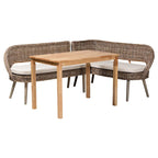 Coin repas moderne bohème en rotin Kubu naturel avec banc et table en bois