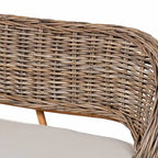 Coin repas moderne bohème en rotin Kubu naturel avec banc et table en bois